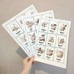 Showing the printed National Pokédex with marble and beige colors.